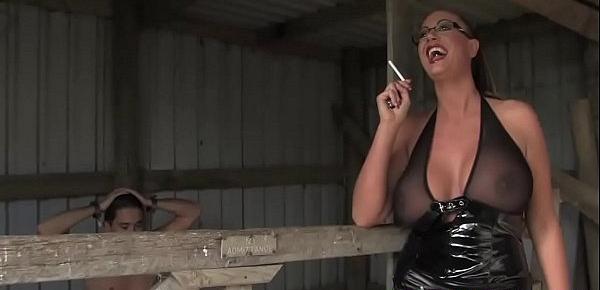  Bigtitted bdsm mistress dominates outdoors